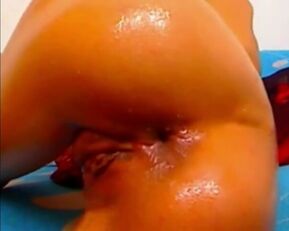 Watch this wild cam girl take on three massive dildos in her ass for the ultimate anal experience!