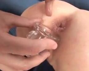 Blonde teen takes a closeup view of a prolapsed asshole getting filled with cum